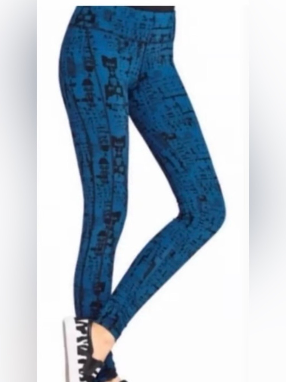 CAbi leggings, blue with black contract geometric design.